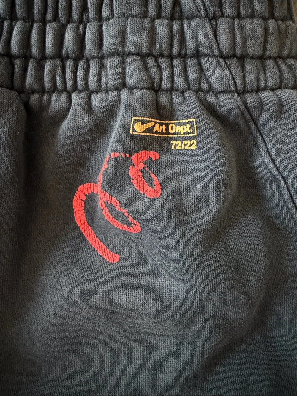 Nike Black Sweatpants with Red Drawstring and Graphics